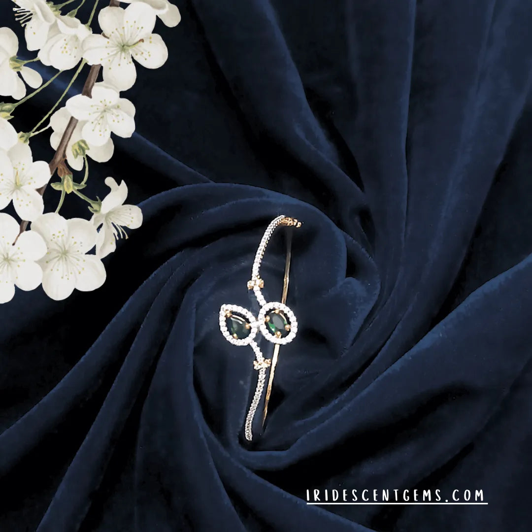 American diamond bracelet shimmering on gold finish—perfect for parties