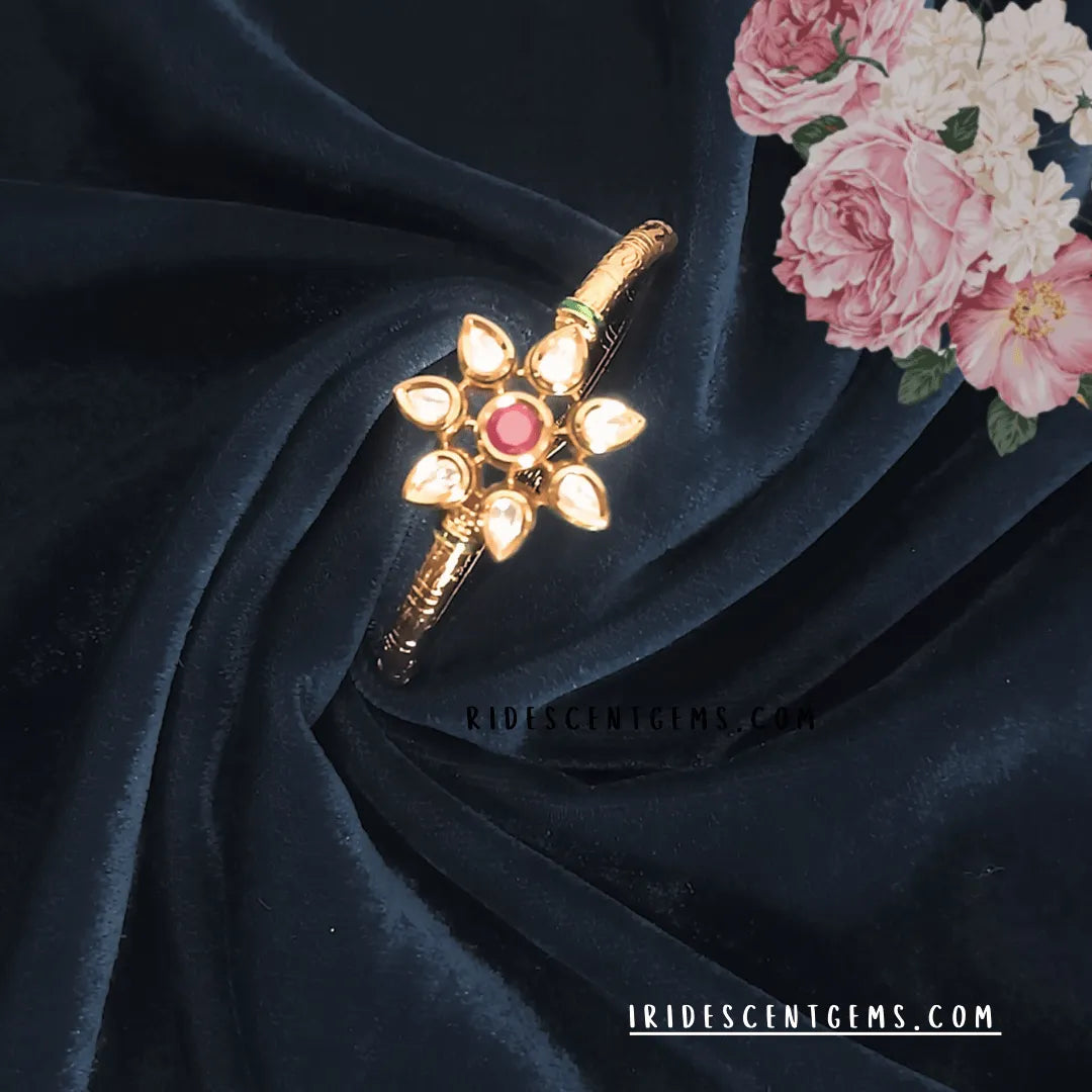 Antique gold bracelet with floral design, Kundan stones, traditional cuff style