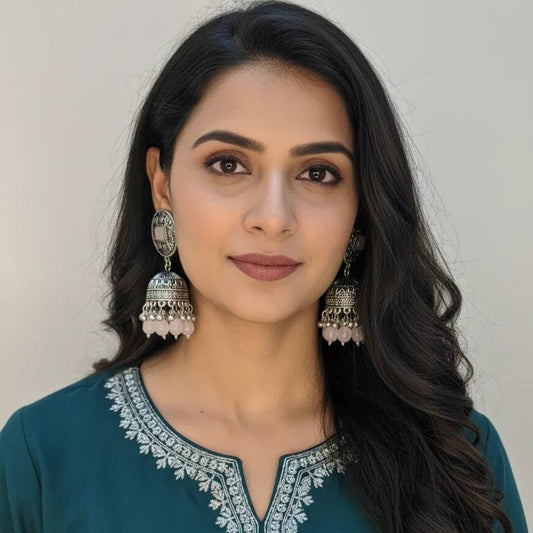 Silver jhumka earrings oxidized finish with pink beads hanging, traditional Indian jhumki for women