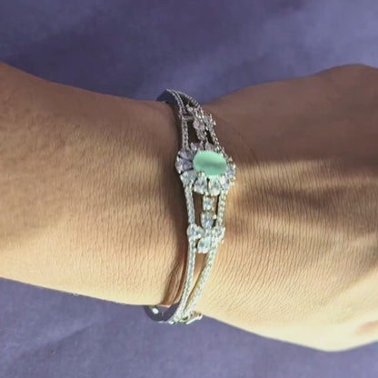 Silver AD stone bracelet on hand showing slip-on comfort - product video
