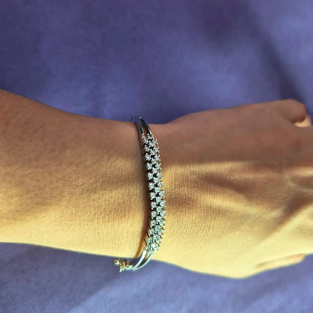 Rhodium plated bracelet for women, American diamond style worn on wrist