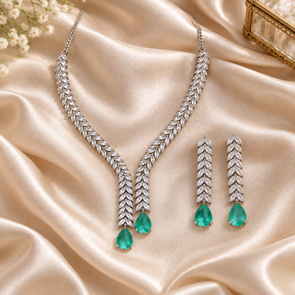 Teal green bridal necklace set with leaf design earrings and maang tikka